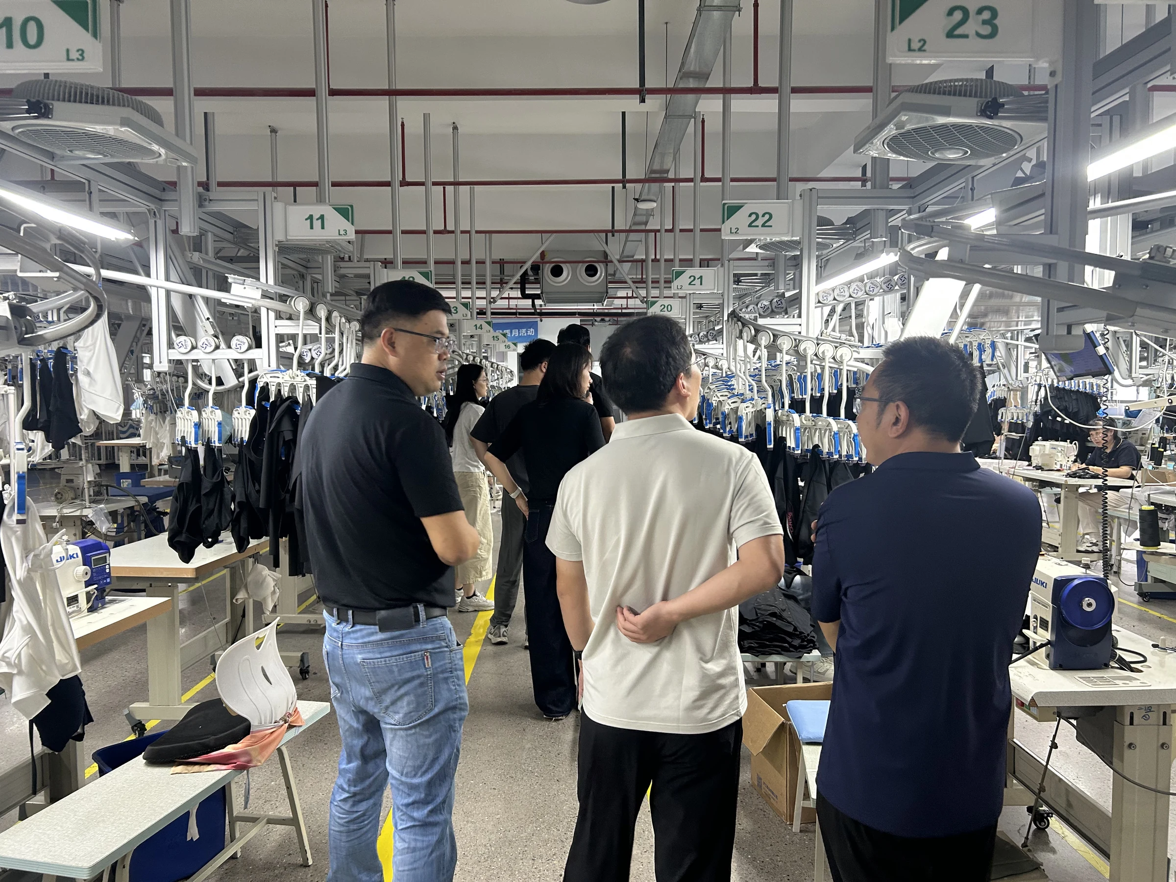 A consultant inspecting a client’s shop floor
