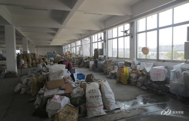 Before: materials piled loose on the floor