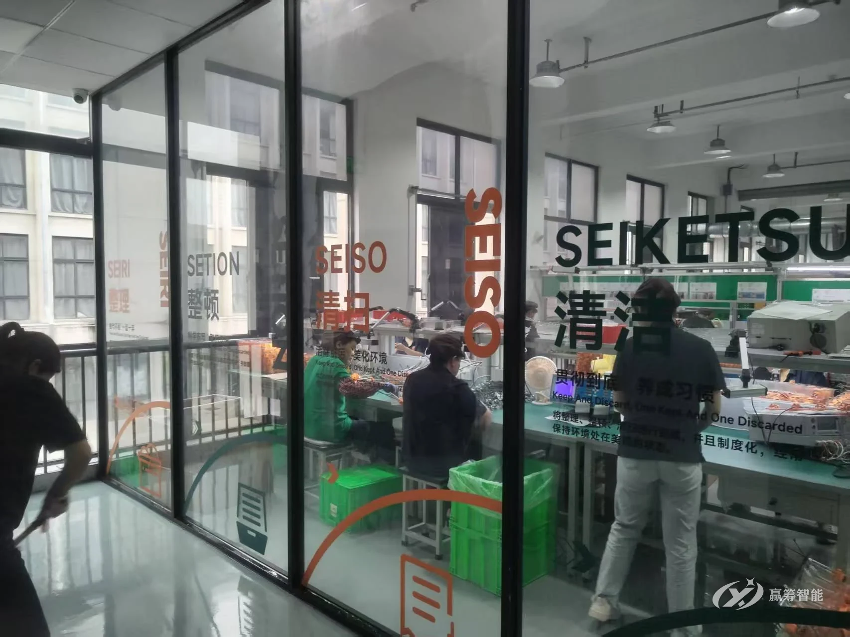 5S-themed graphics on a workshop glass partition, as installed