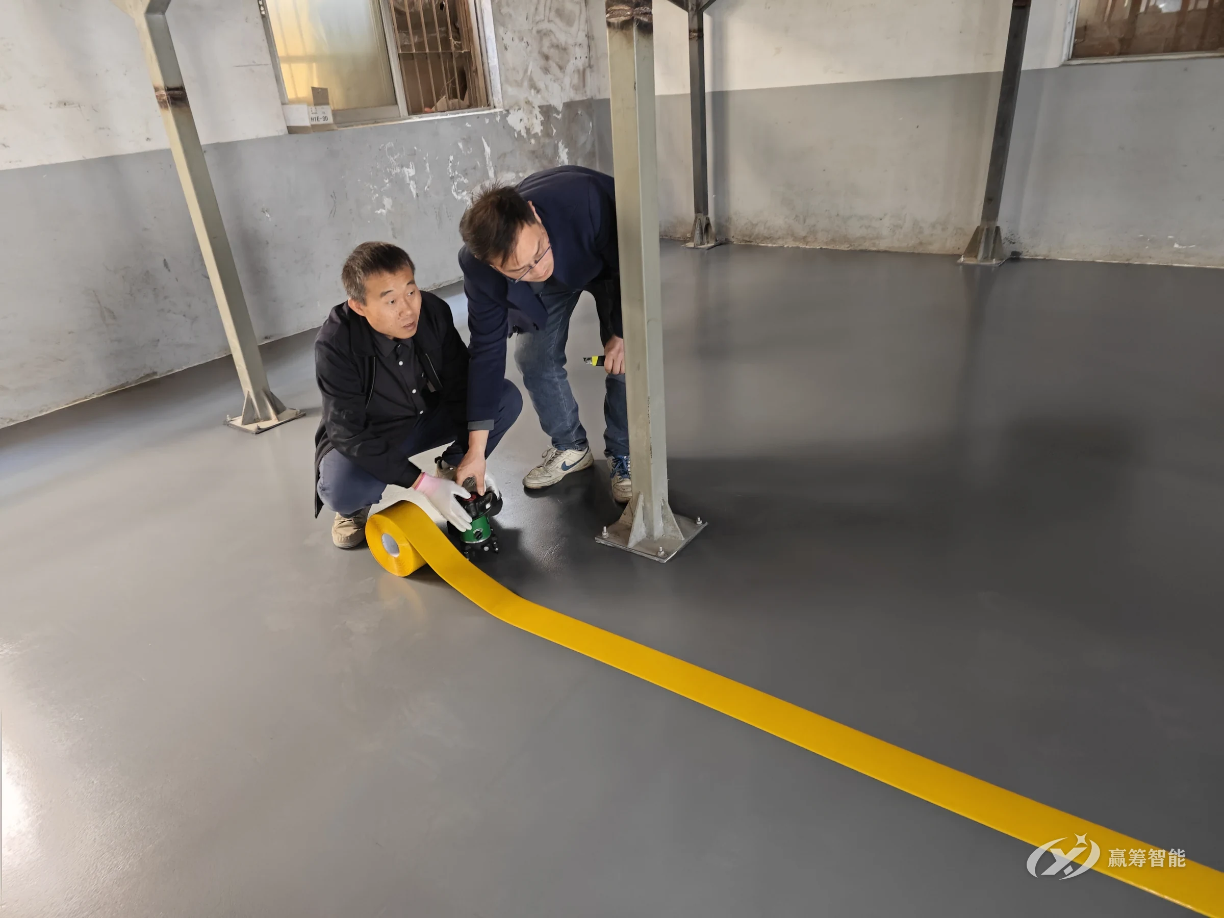 Consultants and client staff marking aisle lines together