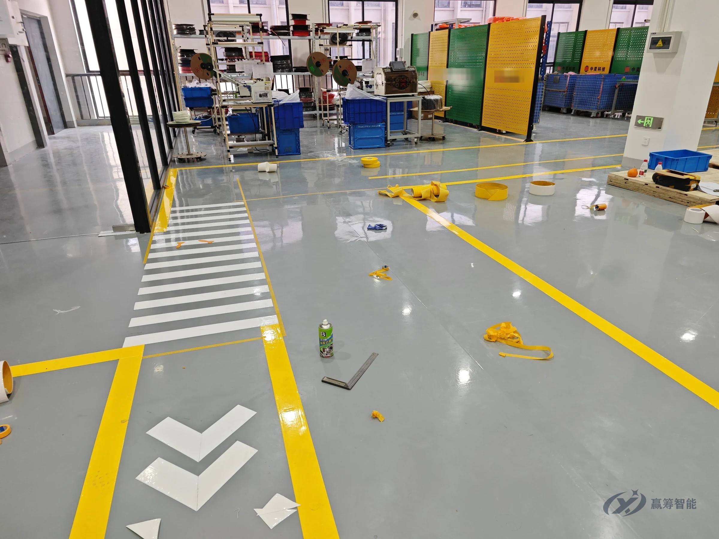 Main shop aisle with crosswalk and direction arrows, as installed